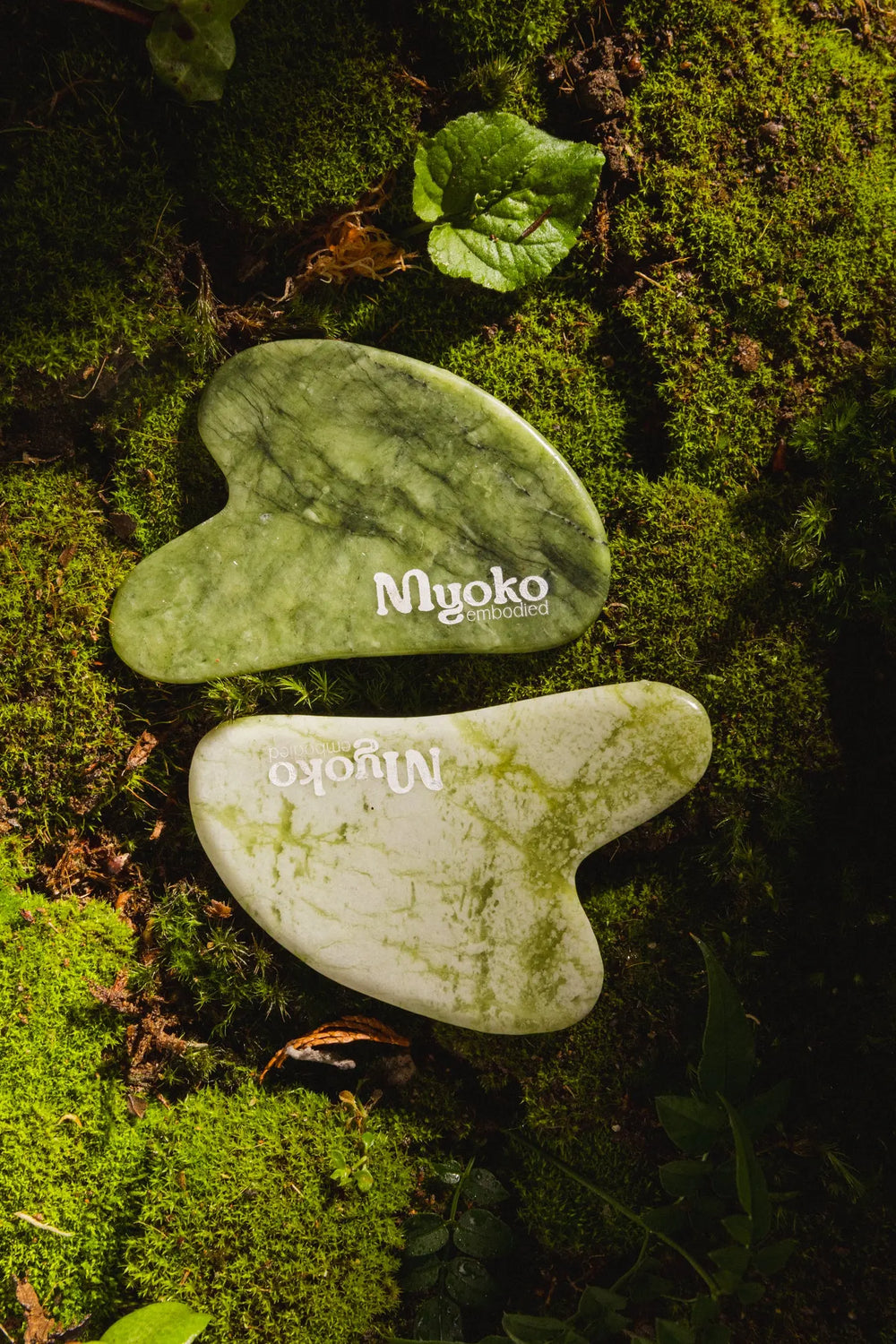 Green stone tool with 'Myoko' branding on a white background
