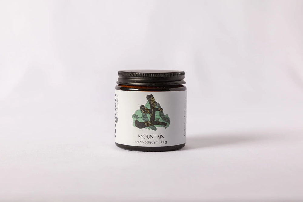 Jar with a label featuring a mountain design on a white background