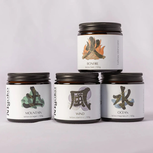 Four jars of Myoko Embodied tallow cream with labels on a light gray background