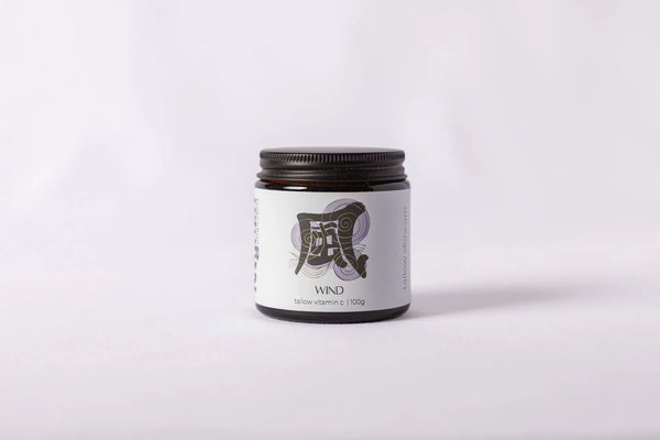 Jar of Myoko tallow cream with a black lid and white label on a light gray background