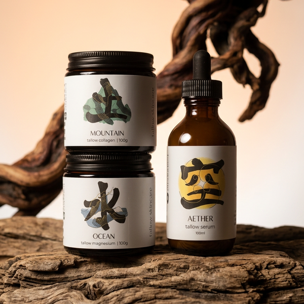 Three bottles with labels on a wooden surface, featuring the brand 'Myoko Embodied'.