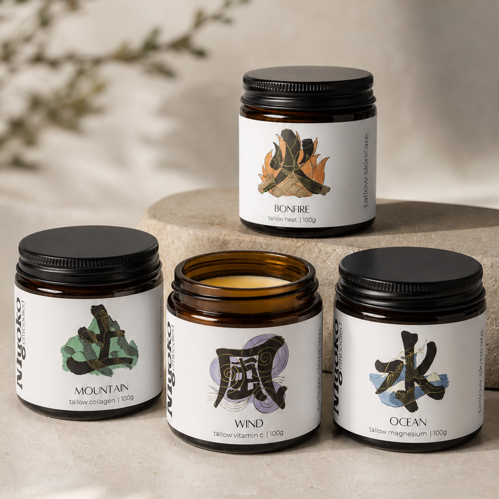 Four jars of Myoko Embodied tallow cream with labels on a light gray background